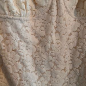 Lace cream colored body suit